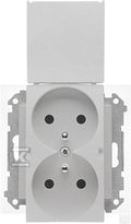 Gniazdo wtyczkowe podwójne do wersji IP44 z uszczelką (moduł) 16 A, 250 V~, szybkozłącza. Klapka w kolorze pokrywy: Aluminium mat, SIMON55