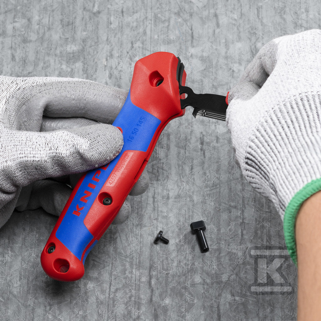 Nóż do ściągania izolacji ze stopką prowadzącą z wielokomponentowymi nasadkami 146 mm