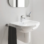 Bateria umywalkowa Grohe Eurosmart jednouchwytowa, rozmiar S, chrom, ogranicznik przepływu 5,7 l/min., głowica Ceramiczna oszczędnościowa 28 mm, zestaw odpływowy z drążkiem, osobne kanały wodne